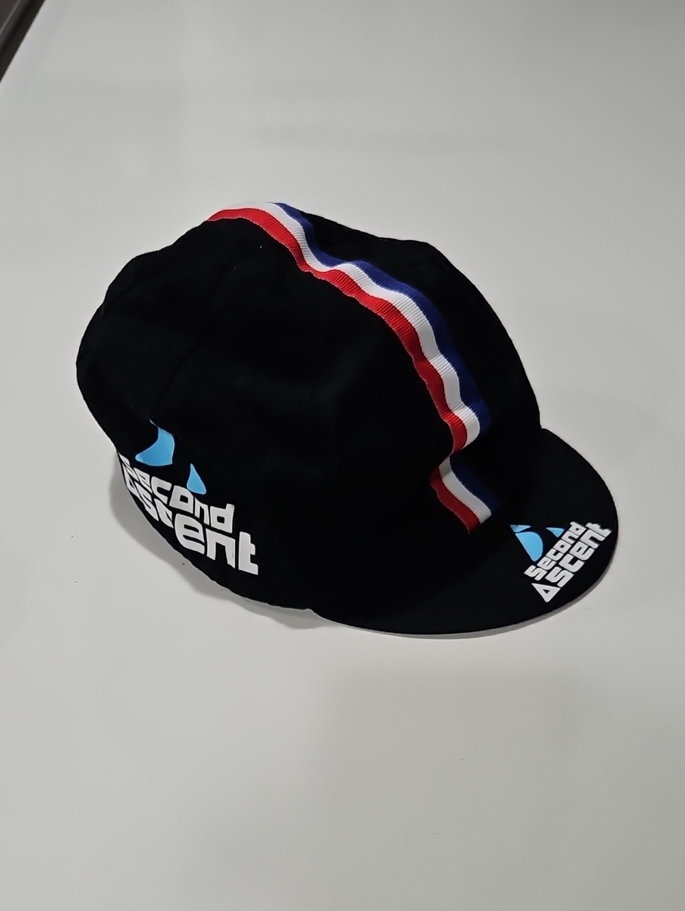 Cycling Cap with Red-White-Blue Stripe and 'Second Ascent' Logo  Vintage